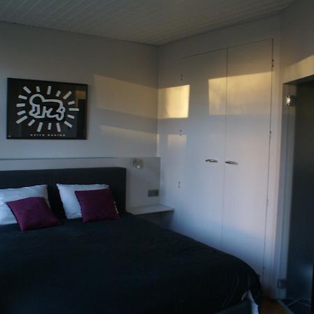 Guest House Feliz Lovaina Habitación foto